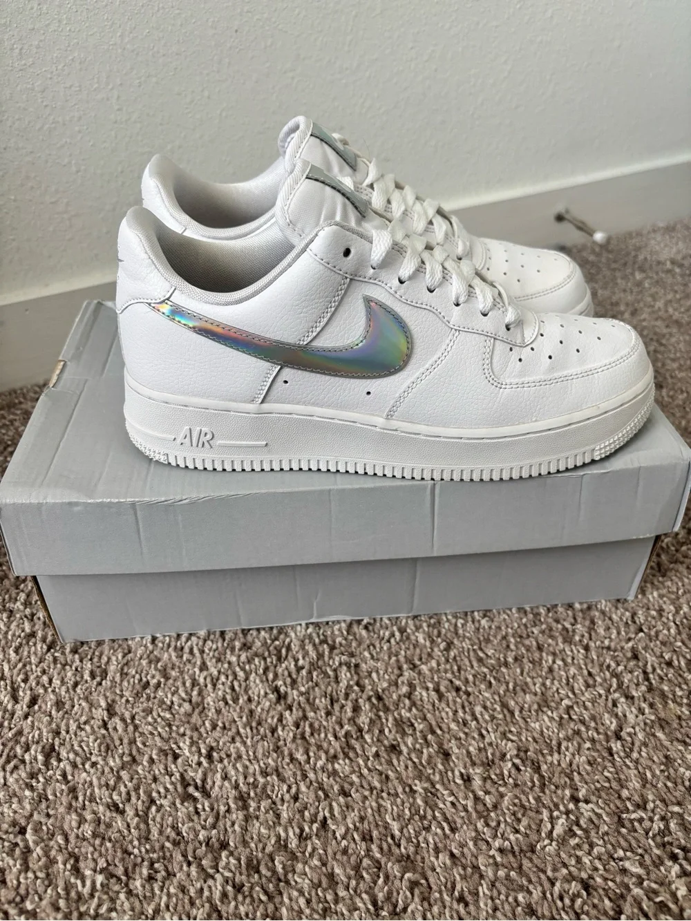 Nike White Low-Top Sneakers with Iridescent Swoosh
